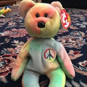 RARE TY BABY. MINT CONDITION. ALL TAGS. PEACE BEAR